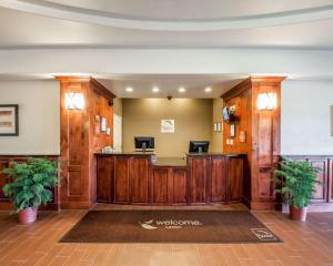 a lobby of a hotel with a waiting area at Sleep Inn & Suites Lawton Near Fort Sill in Lawton