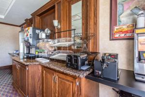 a kitchen with a counter with appliances on it at Quality Inn & Suites Guymon in Guymon