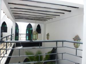 Balkon atau teras di Ryad Laârouss Family