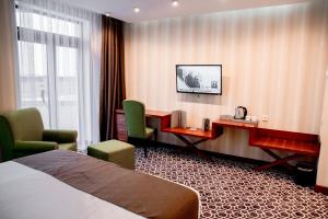 TV a/nebo společenská místnost v ubytování Park Hotel