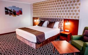 Postel nebo postele na pokoji v ubytování Park Hotel
