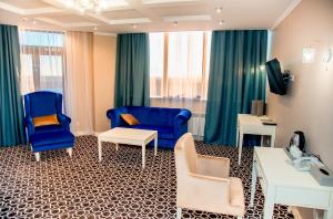 TV a/nebo společenská místnost v ubytování Park Hotel