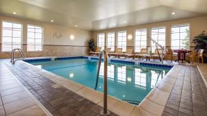 a large swimming pool in a large room at Best Western Shelby Inn & Suites in Shelby