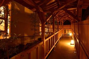 an inside view of a wooden building with a hallway at Okunoin Hotel Tokugawa in Nikko