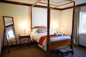 Postel nebo postele na pokoji v ubytování Wildekrans Country House