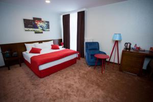 Postel nebo postele na pokoji v ubytování Da Vinci Boutique Hotel