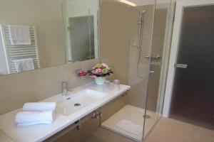 Koupelna v ubytování Hotel Plainbrücke | self check-in + 34 fotografií