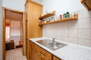 Køkken eller tekøkken på Apartment Mirjana - EV friendly + 51 billeder