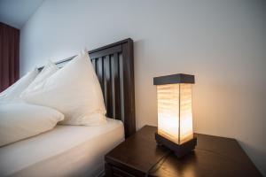 Postel nebo postele na pokoji v ubytování Amselfluh