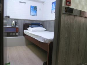 Postel nebo postele na pokoji v ubytování Majestic 7 Guesthouse (formerly KAT Hotel)