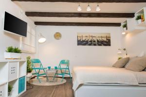 TV a/nebo společenská místnost v ubytování Apartments Kantunal