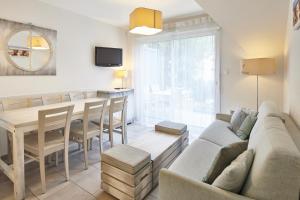 Гостиная зона в Résidence Vacances Bleues Les Jardins d'Arvor