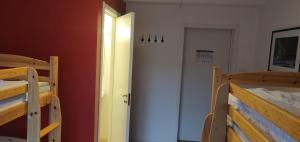 Voodi või voodid majutusasutuse Abisko net Hostel & Huskies toas