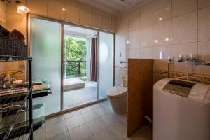 Un baño de E-horizon Resort Condominium Yomitan