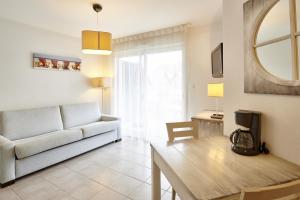 Гостиная зона в Résidence Vacances Bleues Les Jardins d'Arvor