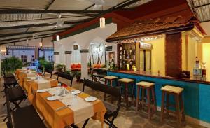 Ресторант или друго място за хранене в Santiago Beach Resort