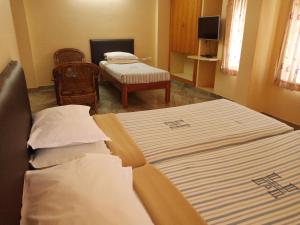 Hotel Victoriyah客房内的一张或多张床位