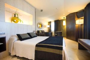 Postel nebo postele na pokoji v ubytování Hotel Torre de Núñez