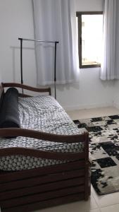 Uma cama ou camas num quarto em Rio Marina Resort