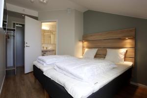 Postel nebo postele na pokoji v ubytování Kvibergs Vandrarhem - Hostel