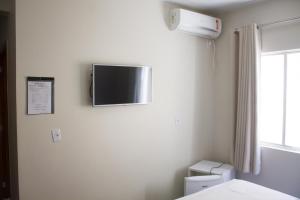 TV a/nebo společenská místnost v ubytování Hotel Colina