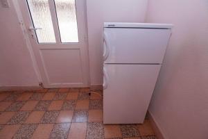 Kuchyň nebo kuchyňský kout v ubytování Villa Pinus