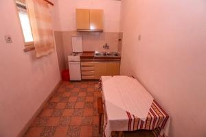 Kuchyň nebo kuchyňský kout v ubytování Villa Pinus
