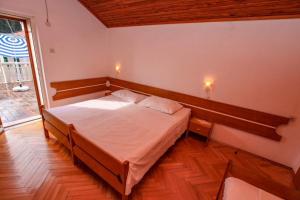 Postel nebo postele na pokoji v ubytování Villa Pinus
