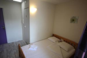 Hotel Abaca客房内的一张或多张床位