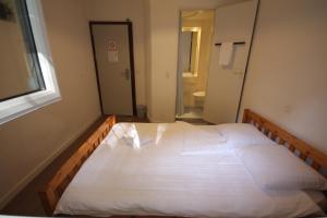 Hotel Abaca客房内的一张或多张床位