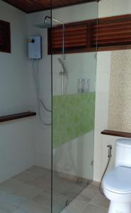 Koupelna v ubytování Rai Lung Tui Homestay + 37 fotografií