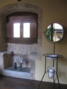 Een badkamer bij Castillo De Valdés Salas