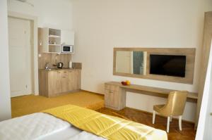 A television and/or entertainment centre at ApartArt Free Parking