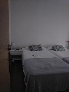 Postel nebo postele na pokoji v ubytování 7 Moons B&B