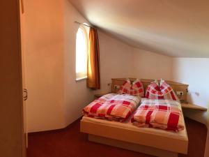 Postel nebo postele na pokoji v ubytování Apartment Sonnblick