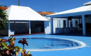 Bazén v ubytování Hotel Maracas Punta Cana nebo v jeho okolí