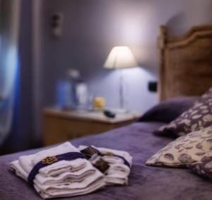 Postel nebo postele na pokoji v ubytování de' Montetini