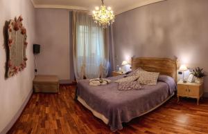 Postel nebo postele na pokoji v ubytování de' Montetini
