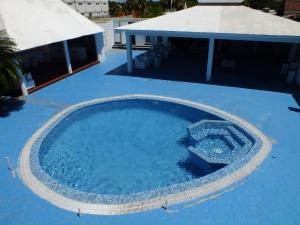 Bazén v ubytování Hotel Maracas Punta Cana nebo v jeho okolí