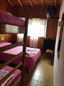 Postel nebo postele na pokoji v ubytování Las Violetas