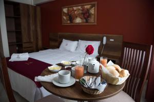 Postel nebo postele na pokoji v ubytování Hotel Central