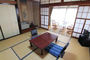 Posezení v ubytování Yamadaya Ryokan