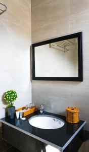 Phòng tắm tại Flora Quy Nhon Hotel