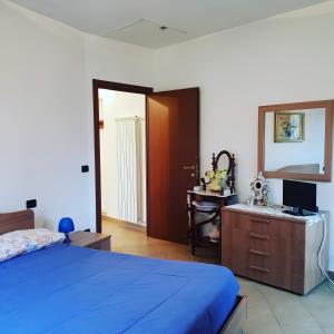 Posteľ alebo postele v izbe v ubytovaní La casa di Gina