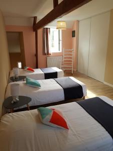 Ένα ή περισσότερα κρεβάτια σε δωμάτιο στο maison à 300 mètres de la mer