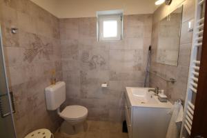 Kúpeľňa v ubytovaní Szent Iván Apartman