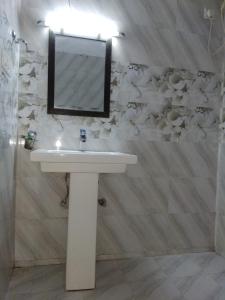 Kylpyhuone majoituspaikassa Basant Watika