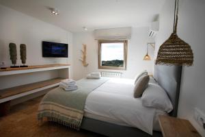 Postel nebo postele na pokoji v ubytování Abeniss Boutique B&B