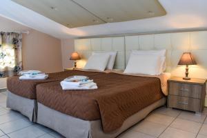 Een bed of bedden in een kamer bij Govino Bay