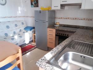 Η κουζίνα ή μικρή κουζίνα στο Casa Riveira Grande,Il Apartamentos +50 φωτογραφίες